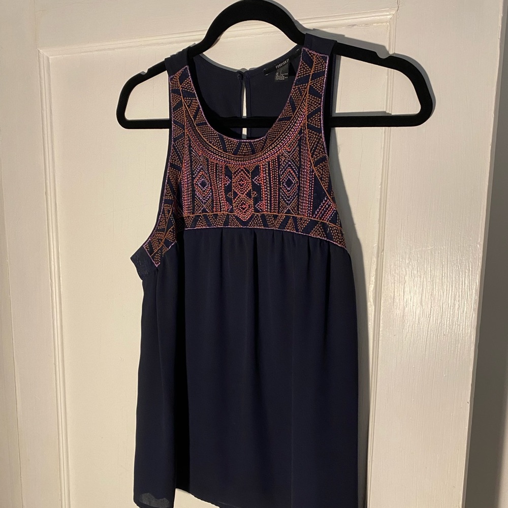 Sleeveless, embroidered navy top, lightweight and loose fit